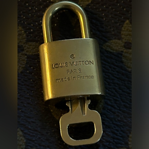 Authentic Louis Vuitton Lock & Key Set #332. - Picture 2 of 4